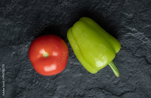 Close up photo of fresh organic tomato and pepper