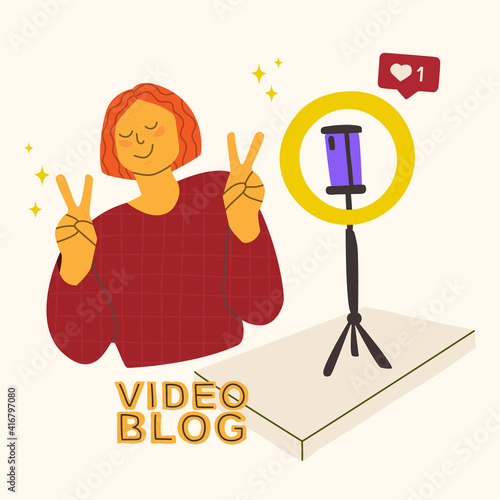 Teenager makes video content for his blog. Cute girl or guy posing in front of the smartphone camera. Round lamp on a tripod. Vector flat illustration.