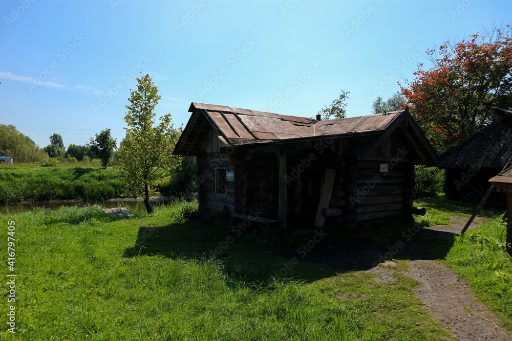 old wooden barn in the russian outback village