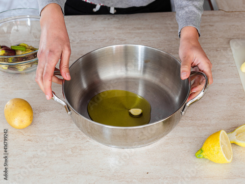 Obraz na plátně Woman preparing a vegan recipe