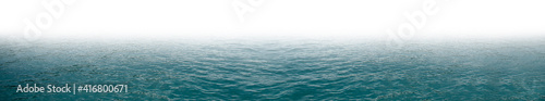 Wide horizontal copy space surface water texture for background. Water isolated with white room for text suitable for print or web banner. Panoramic image with calm relaxing clear sea top level.
