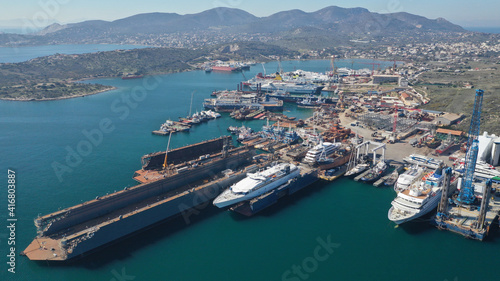 Aerial drone photo of industrial shipyard in old port of Salamina island, Attica, Greece © aerial-drone