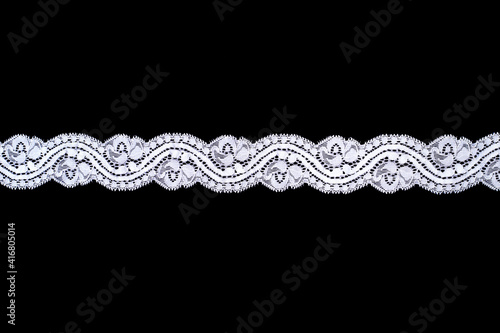 Wallpaper Mural Lace trim ribbon over black background Torontodigital.ca