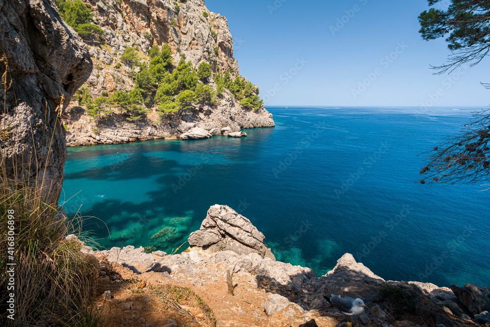 A view on a beautiful lagoon in Sa Calobra from a hiking trail on Mallorca island in Mediterranean Sea A view on a beautiful lagoon in Sa Calobra from a hiking trail on Mallorca island in Mediterranean Sea
