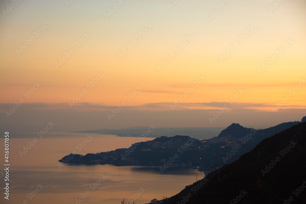 Top view of a sunset on the Ionian coast in Sicily