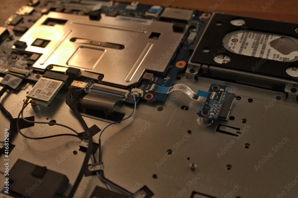 Fototapeta premium repairing broken disassembled laptop
