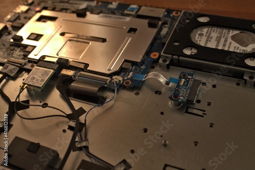 repairing broken disassembled laptop