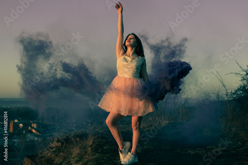Beauty girl colored smoke