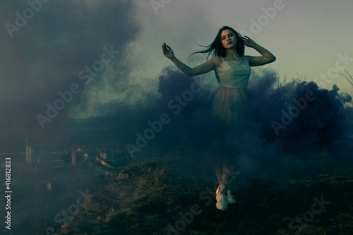 Beauty girl colored smoke