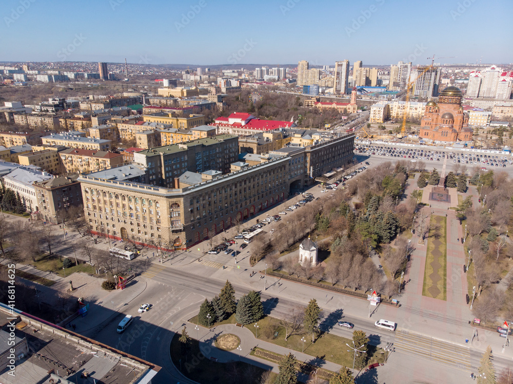 Alexander Nevsky Cathedral in Volgograd / View of the city and the Volga from above. Multi-storey buildings and parks.