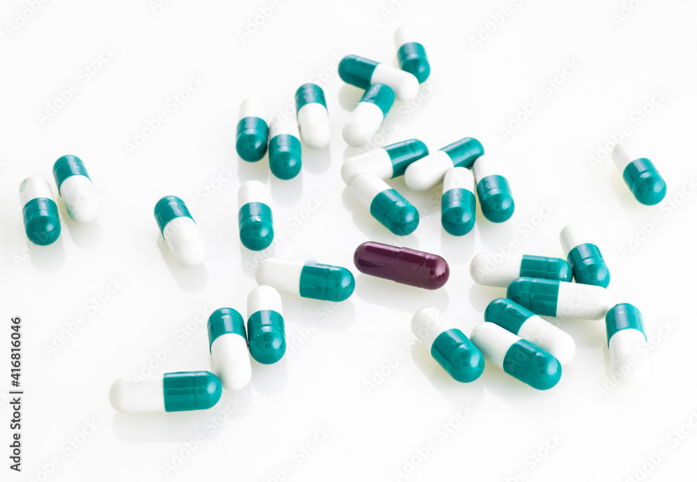 pills on white background.