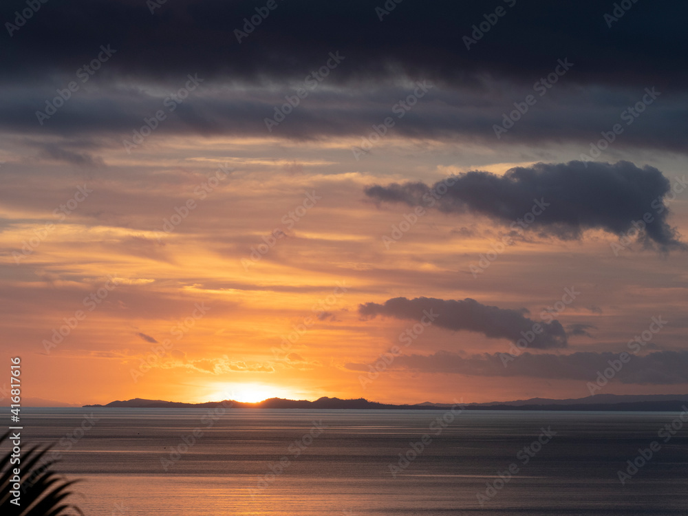 Fiji, Vanua Levu. Sunset over the ocean.