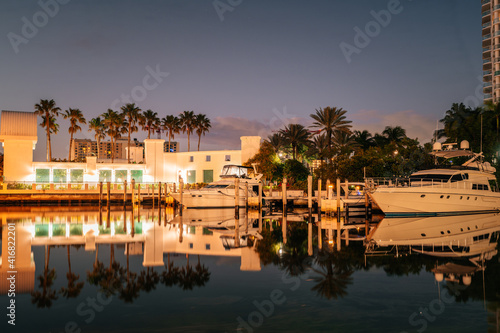 marina at night sunrise beautiful place florida sunny isles reflections water river lake sea palms house lights boats pier sky clouds relax paradise