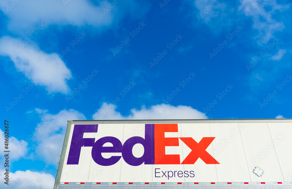 FedEx Express sign on the side of FedEx Corporation delivery truck