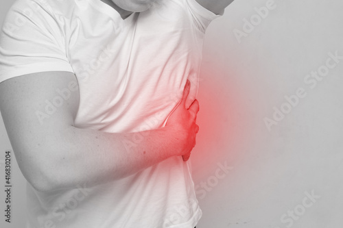 Person man experiencing pain from intercostal neuralgia photo