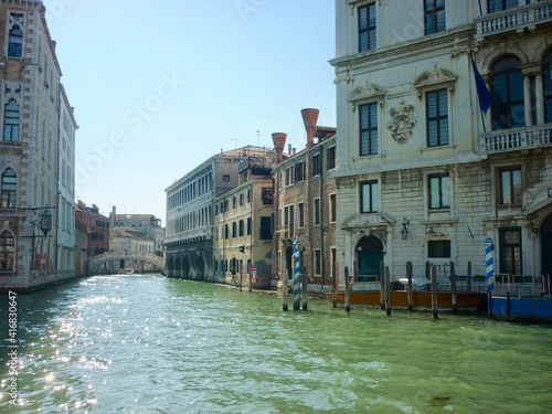VENICE CANAL ON SUNNY DAY. TOURISM.
