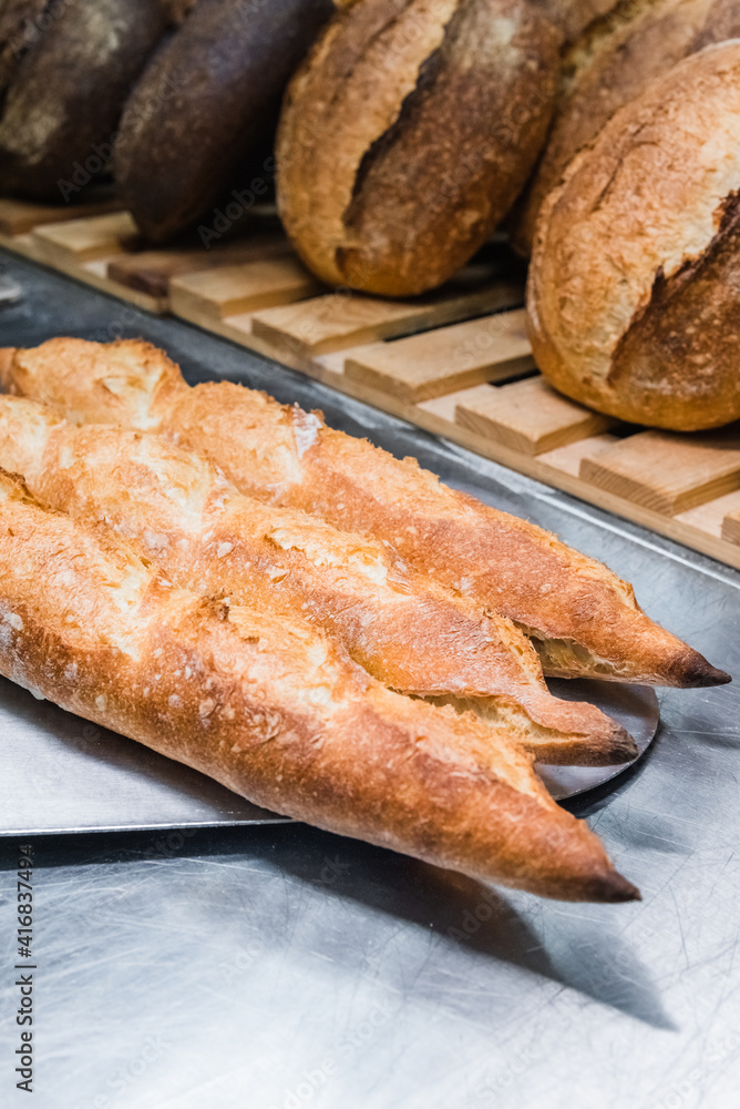 Craft bread on the table at the bakery. The concept of small industries and healthy food