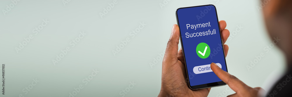 Businesswoman Filling Online Survey On Mobile Phone Businesswoman Filling Online Survey On Mobile Phone