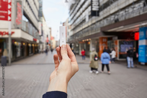 Covid rapid test and vaccination Corona measures Travel time city center pedestrian shopping