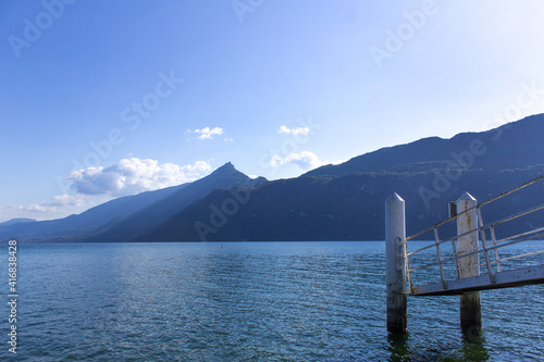 Lac Bourget summer water view with Dent du Chat mountain peak Aix les Bains thermal town Rhone alpes region France © АliVa