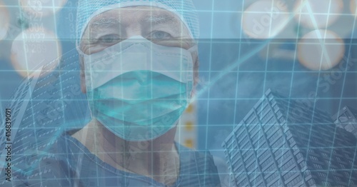 Digital illustration of male doctor wearing coronavirus covid19 mask with graph and cityscape 