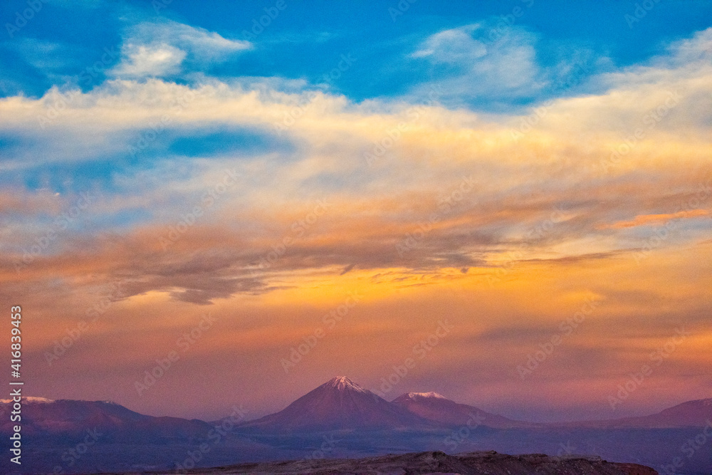 Snow-capped mountain with Atacama Desert at sunset, San Pedro de Atacama, Antofagasta Region, Chile