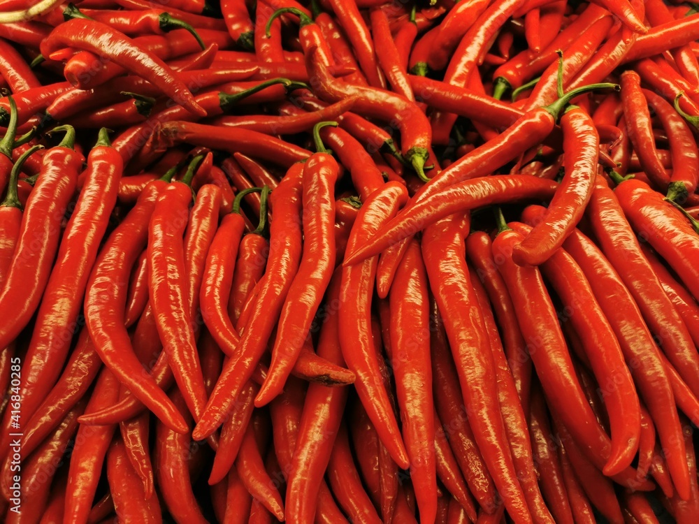 patterns and designs from many shiny red long shaped peppers patterns and designs from many shiny red long shaped peppers