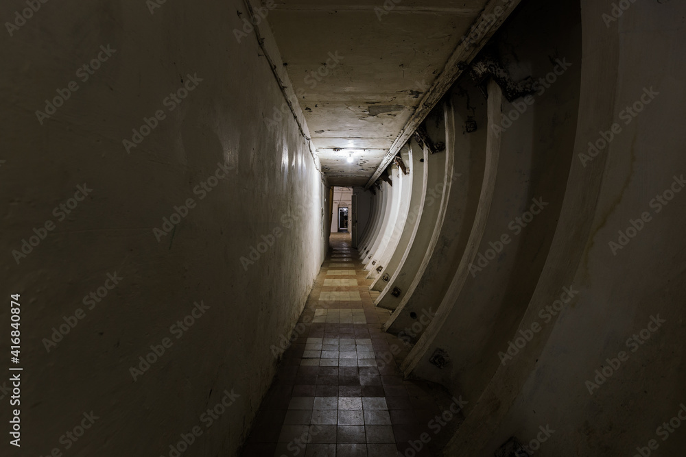 Fototapeta Dark abandoned Soviet bunker, echo of Cold War