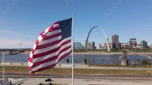 The Gateway Arch is a monument in down town St. Louis, Missouri , United States. Clad in stainless steel and built in the form of a weighted catenary arch, it is the world's tallest arch USA Flag 