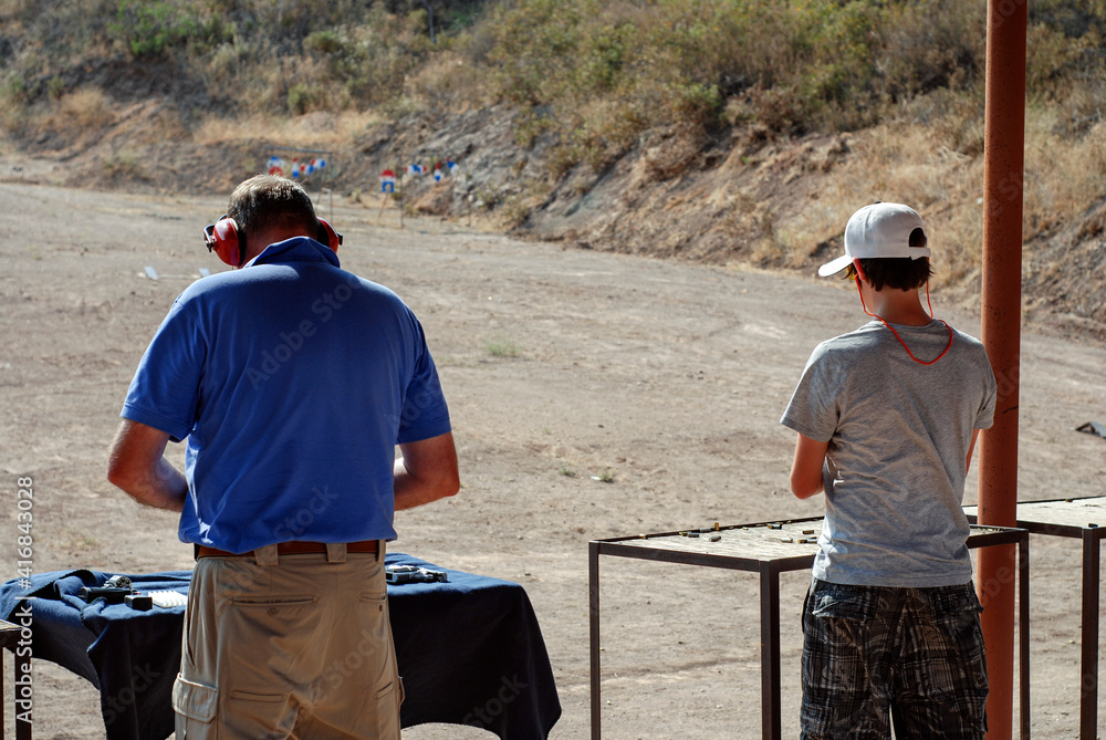 Shooters reloading at the range