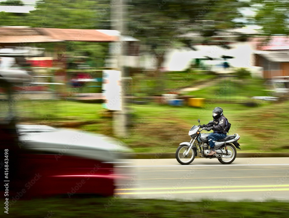 motorcyclist caught in motion