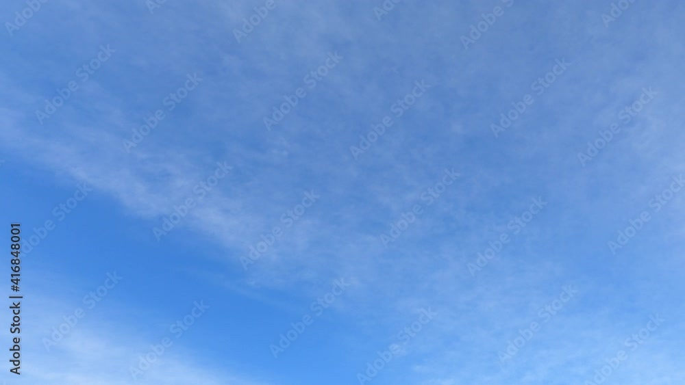 Sunny clear blue sky background with airy white cloud or cirrus n cirrostratus cloudscape on beautiful daylight horizon in tropical summer or spring sunlight n sunray, 4k cinemagraphs b-roll TimeLapse Sunny clear blue sky background with airy white cloud or cirrus n cirrostratus cloudscape on beautiful daylight horizon in tropical summer or spring sunlight n sunray, 4k cinemagraphs b-roll TimeLapse