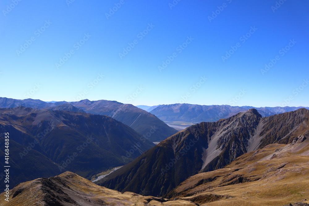 Alpine mountains blue sky landscape valley Arthur's Pass National Park Alpine mountains blue sky landscape valley Arthur's Pass National Park