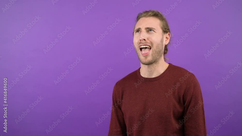 close-up portrait of a man grimacing with his interlocutor. absurd dialogue. long-haired man shows blah blah gesture 4K close-up portrait of a man grimacing with his interlocutor. absurd dialogue. long-haired man shows blah blah gesture 4K