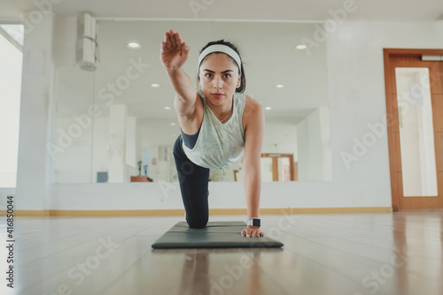 woman exercising alone