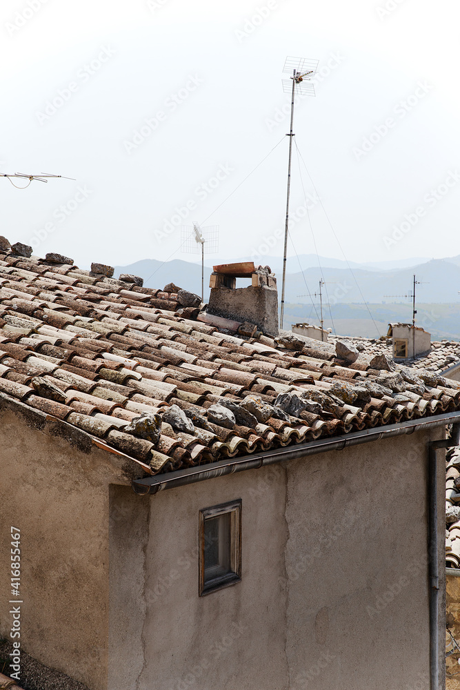 old roof with chimney