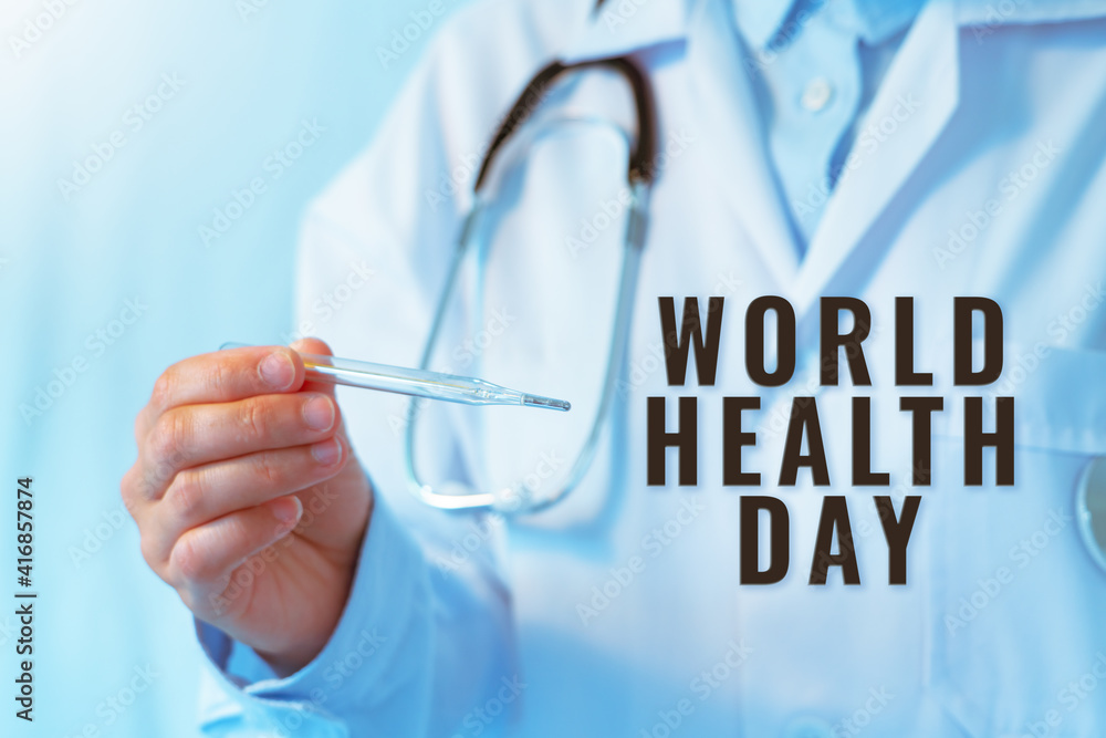 World Health Day concept, Coronavirus stop infection. doctor holding thermometer and stethoscope against infectious diseases and flu World Health Day concept, Coronavirus stop infection. doctor holding thermometer and stethoscope against infectious diseases and flu