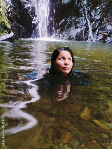 Fototapeta Naklejka Na Ścianę i Meble -  girl in the waterfall