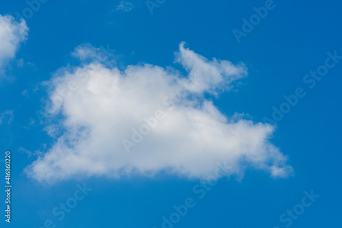 Close-up of a white cloud with blue sky background