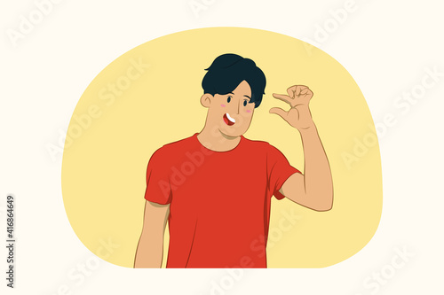 Young man gesturing demonstrating size with workspace concept