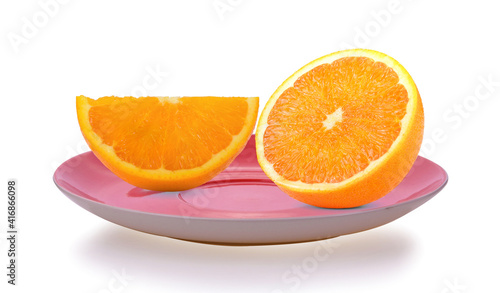 Orange slice isolated in red plate on white background