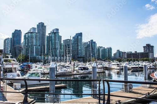 Vancouver, British Columbia, Canada Septembre 2, 2020: Beautiful view of Vancouver skyline with ships lying in harbor at False Creek, photo