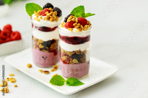 Greek yogurt with chia seeds, walnuts and raspberries