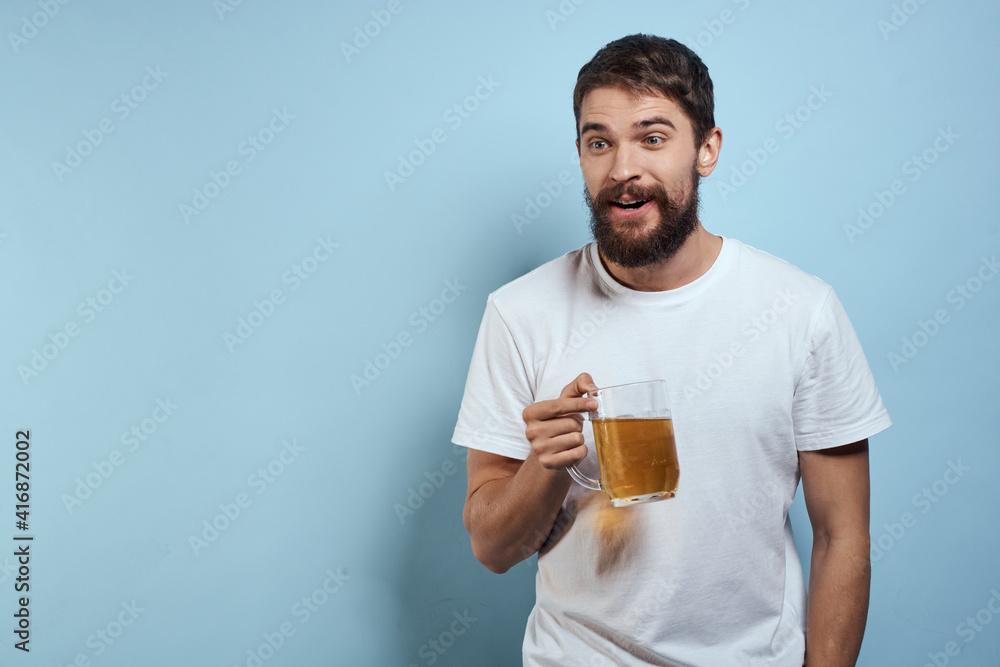 Cheerful drunk man beer mug diet food fun blue background Cheerful drunk man beer mug diet food fun blue background