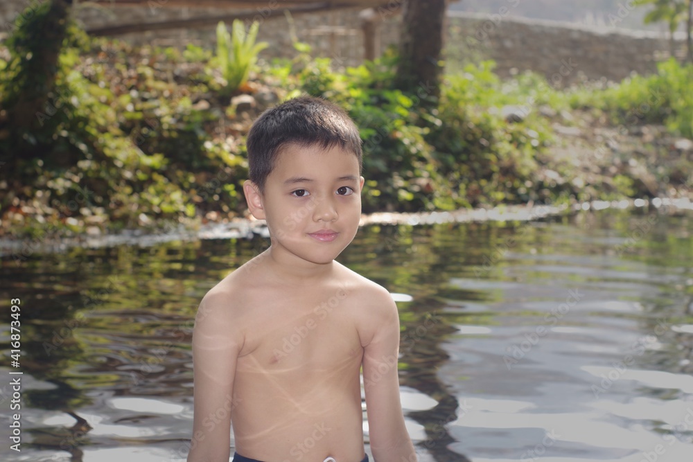 Fototapeta premium child in the water