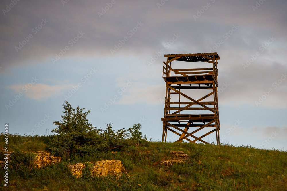 Wooden tower for hunting or watching around