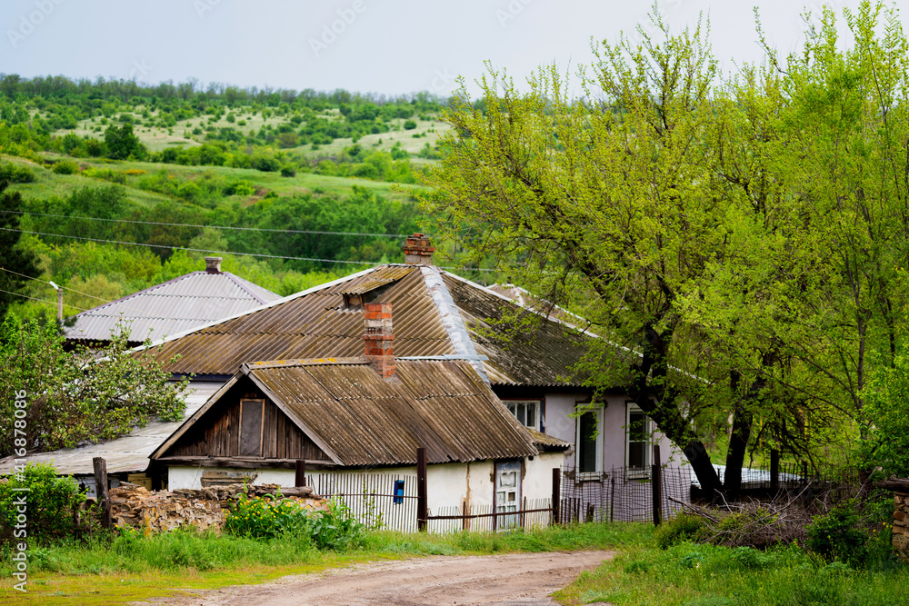 View of traditional village wooden clay white houses View of traditional village wooden clay white houses