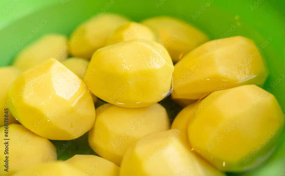 Peeled washed potatoes in a ish. Peeled washed potatoes in a ish.