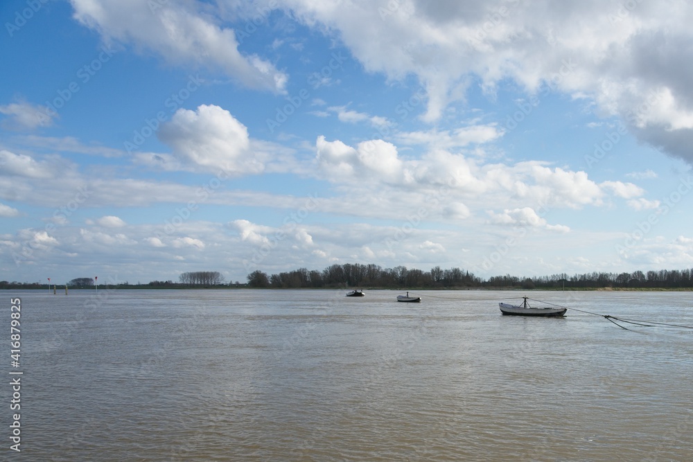 Cable ferry (gierpont) over the river Rhine between Wageningen and Opheusden in the Netherlands Cable ferry (gierpont) over the river Rhine between Wageningen and Opheusden in the Netherlands