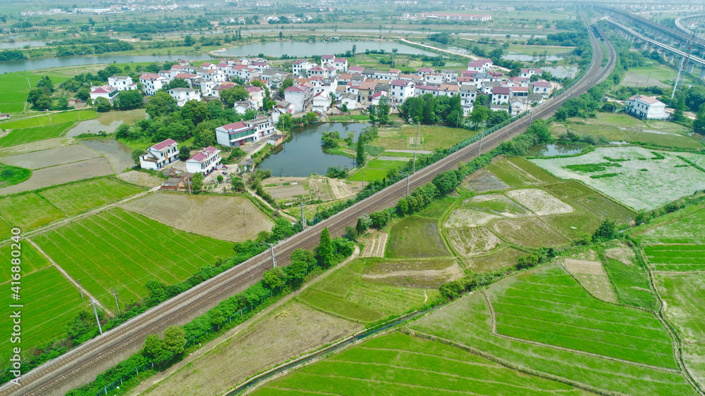 Aerial view of green fields and rural roads; beautiful Chinese rural scenery